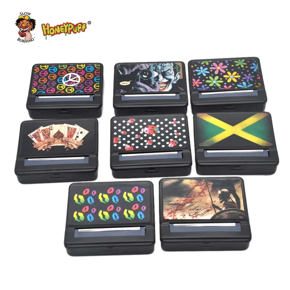 

HONEYPUFF New Arrival Rasta Design Metal Rolling Machine Case With Sticker Cigarette Roller For 70mm paper.Pattern Randomly