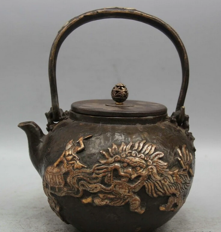 

Elegant old S5791 9" Archaic Japanese Iron Silver Gilt Fu Foo Lion Man Kettle Wine Tea Pot Flagon A0403