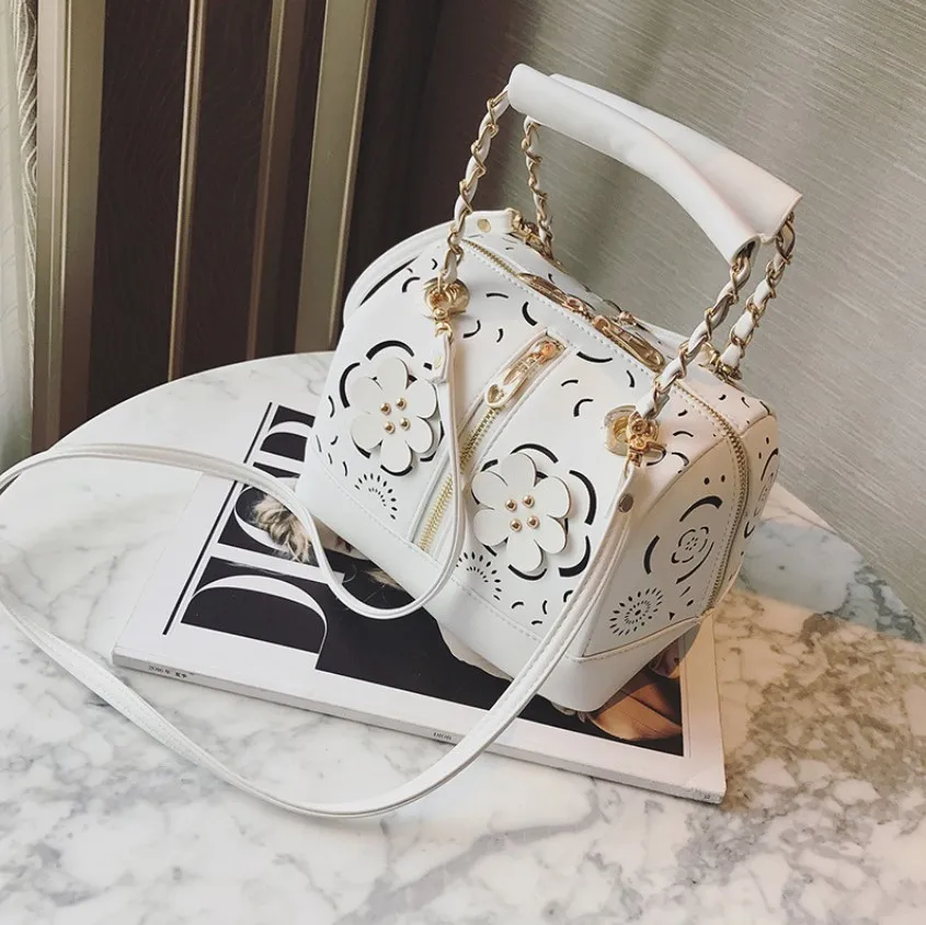 

New Fashion Women Handbag pu leather Bucket bags Totes Hollow out Flowers Rivet Boston Bags Famous Designer shoulder Bags Ladies