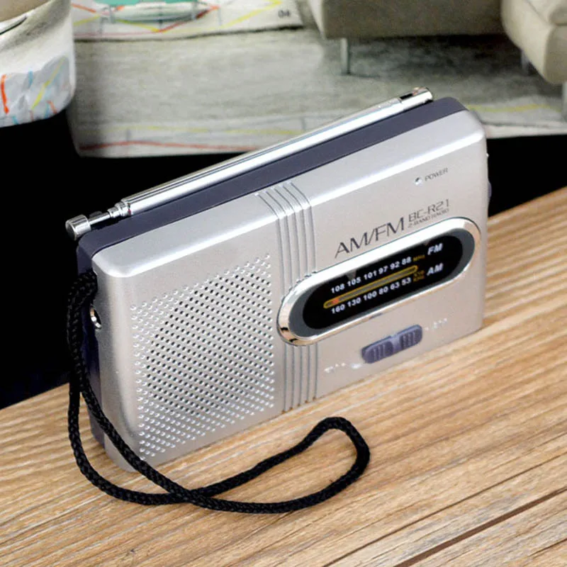 

Portable AM/FM Mini Radio with Telescopic Antenna Dual Band Channel Receiver Speaker WIF66