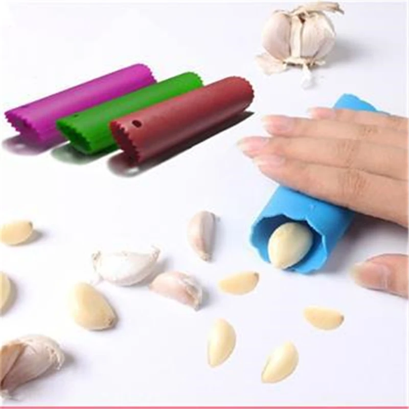 

Random Color Creative Silicone Garlic Peeler Practical Utility Kitchen Gadget Garlic Stripper Tube Peeling Garlic Peeling 2017