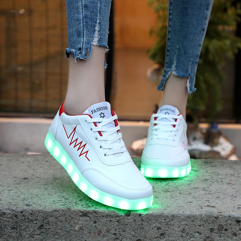

Korean version of ghost shoes men and women junior high school students board shoes USB charging LED light shoes Luminous Sneake