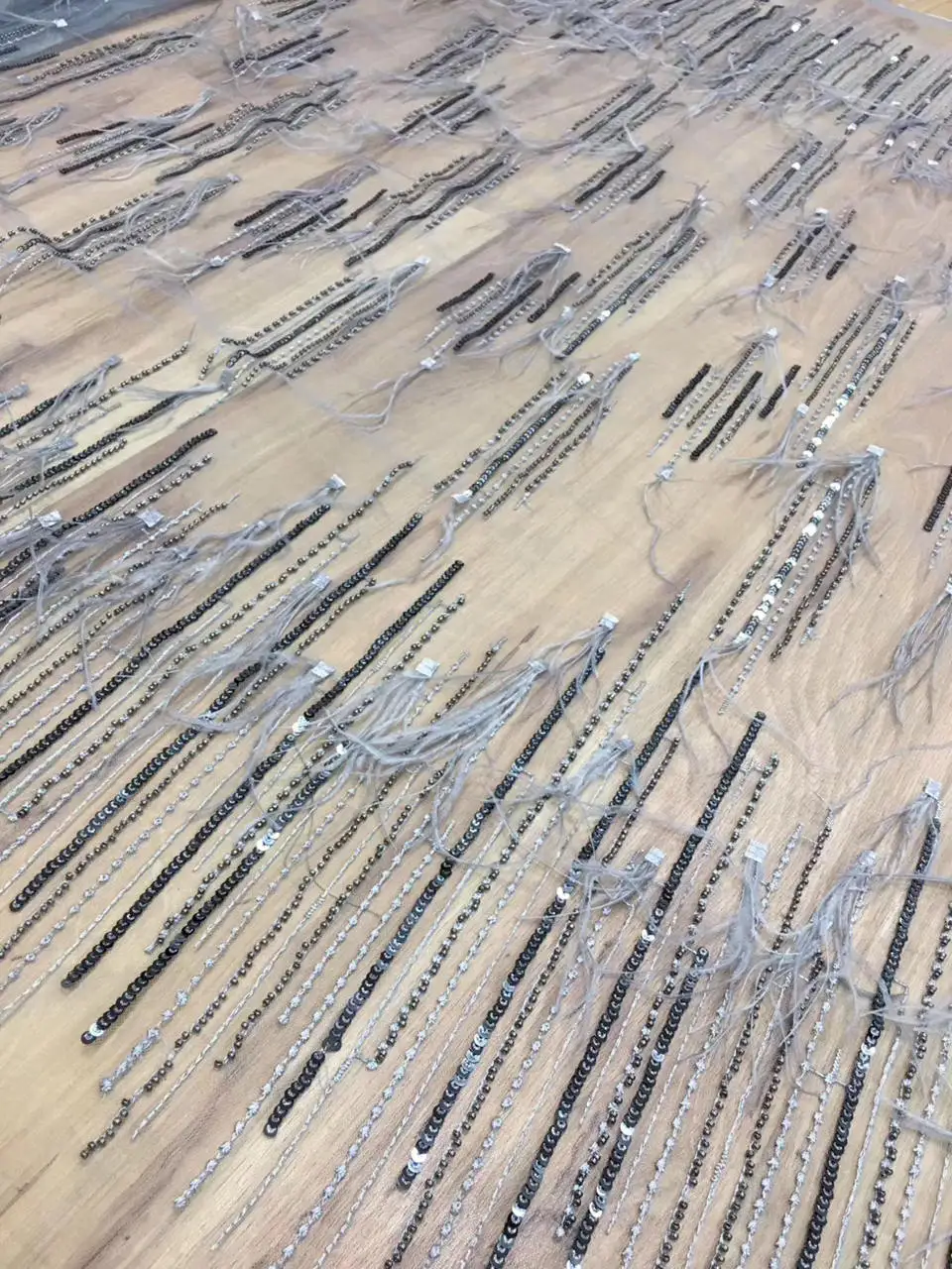 

Luxury embroidered tulle lace fabric handwork french net lace fabric with feather and crystal beads Super quality DG031