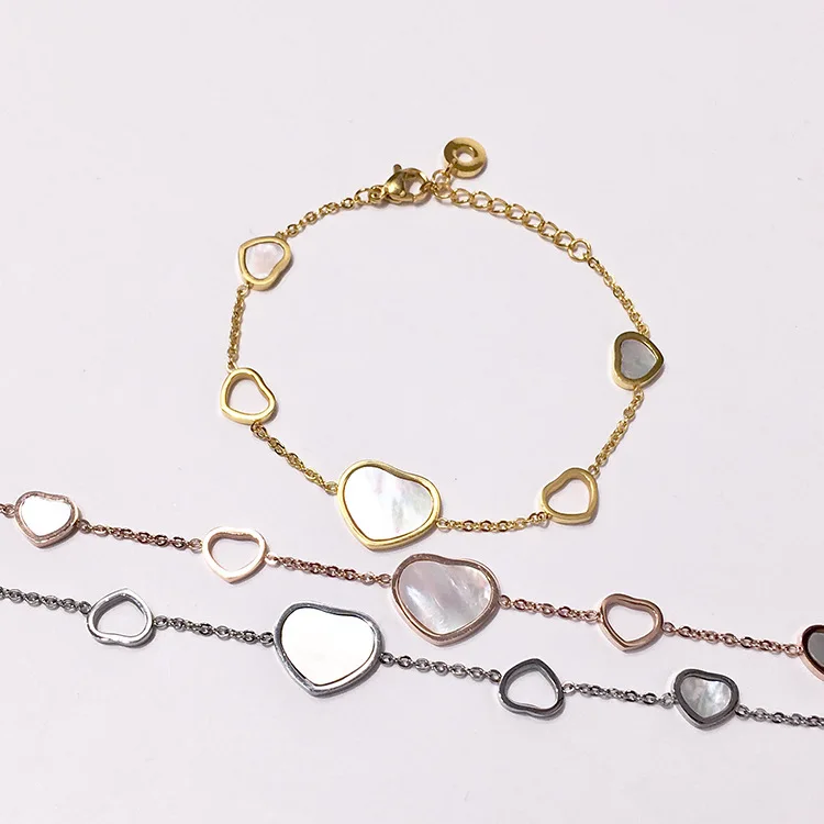 

Exquisite heart-shaped white fritillary stitching hollow love irregular string titanium steel bracelet for women