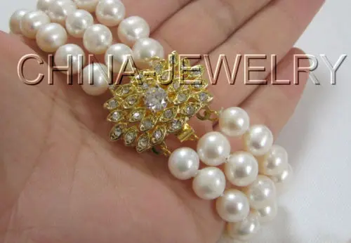 

Wholesale price 16new ^^^^ Beautiful 8" 3row 9mm round white freshwater pearl bracelet -golden zircon clasp