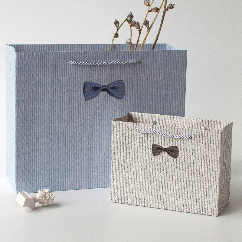 

1pc Simple Style Bow Business Gift Bag Color Paper Gift Bag Handbags Reticule Party Girl Boy Clothing packaging Wedding Support