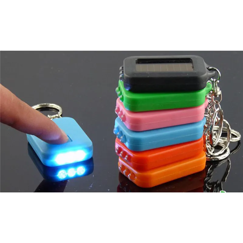 

NDTUSMZ flashlight mini solar powered flashlight torches key with single file and colorful RechargeableLED Light Keychain Torch