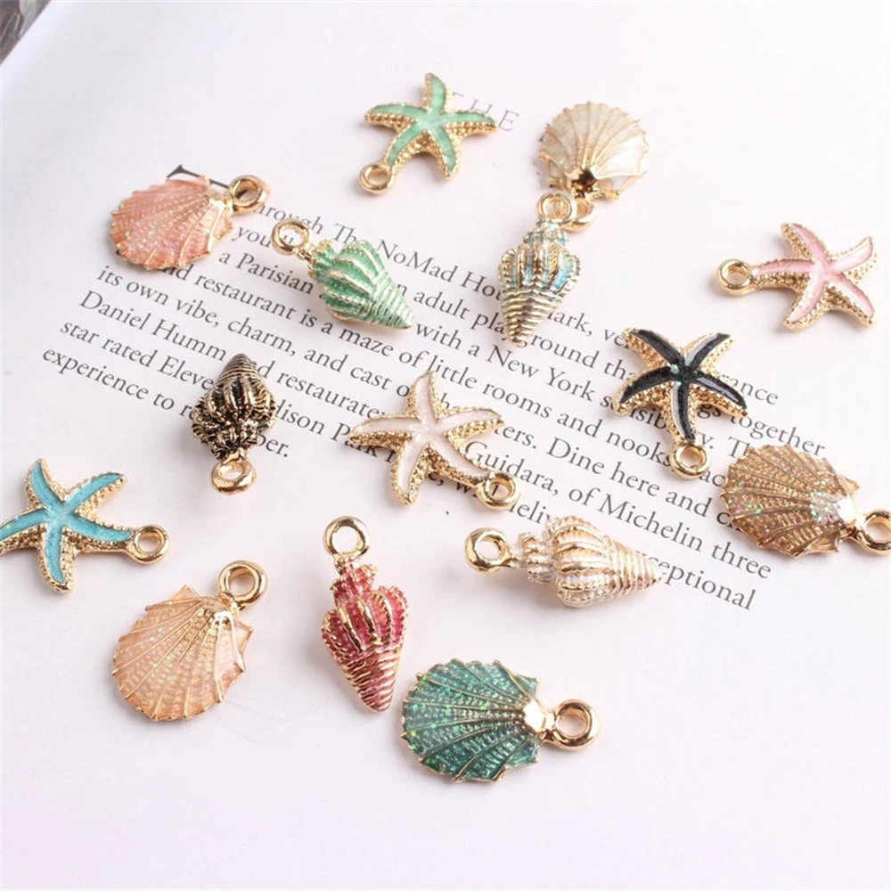 

Hot! 13Pcs/Set Cute Colorful Conch Sea Shell Charms Ocean Pendants Making DIY Handmade Accessories Craft Making or Decoration