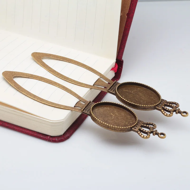

Antique Bronze Metal Zinc Alloy Cameo Crown Bookmarks 18*25mm Oval Bookmarks Cabochon Settings 8pcs/lot 7568