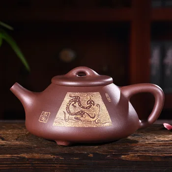 

Yixing purple clay pot genuine hand-made raw ore Purple mud Zodiac snake stone ladle pot Kungfu Teapot Set wholesale