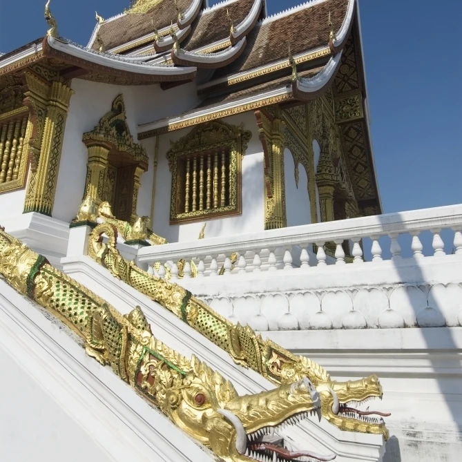 Laos  Luang Prabang  Wat Sen  Architectural detail of dragpns along side of building. Poster Print (12 x 18)