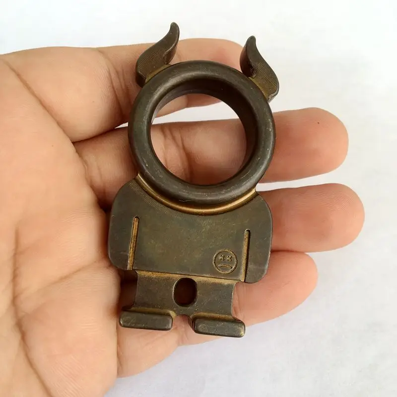 

Multifunction Outdoor EDC Tools Black Color Brass Humanoid Horn Keychain