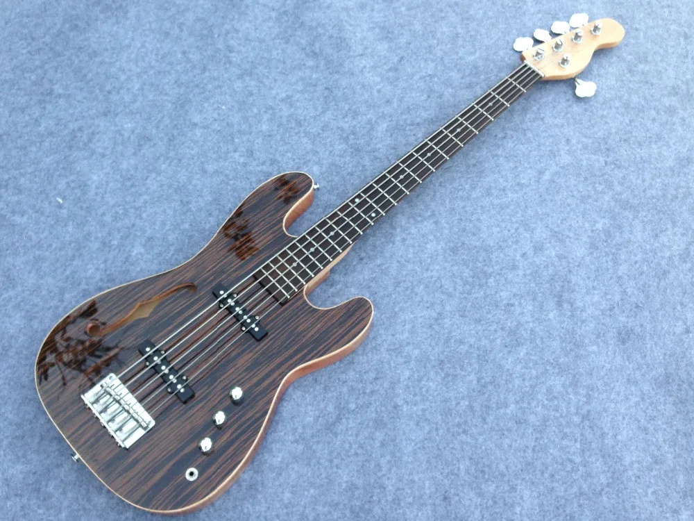 Precison electric bass guitar with F hole ,zebra wood top flamed maple
