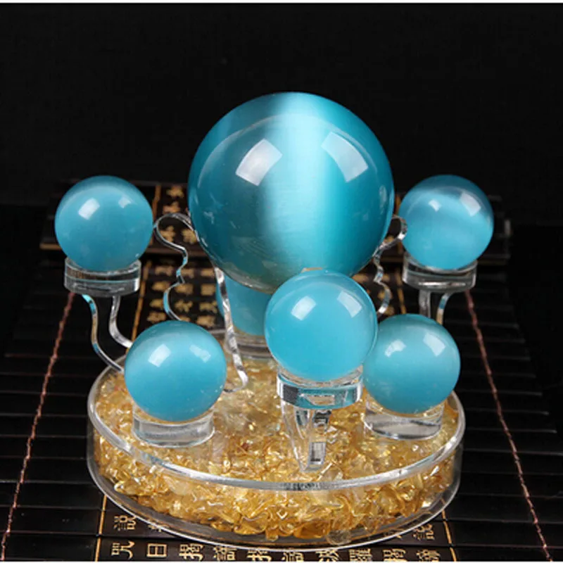 

Seven array of blue opal ball ornaments