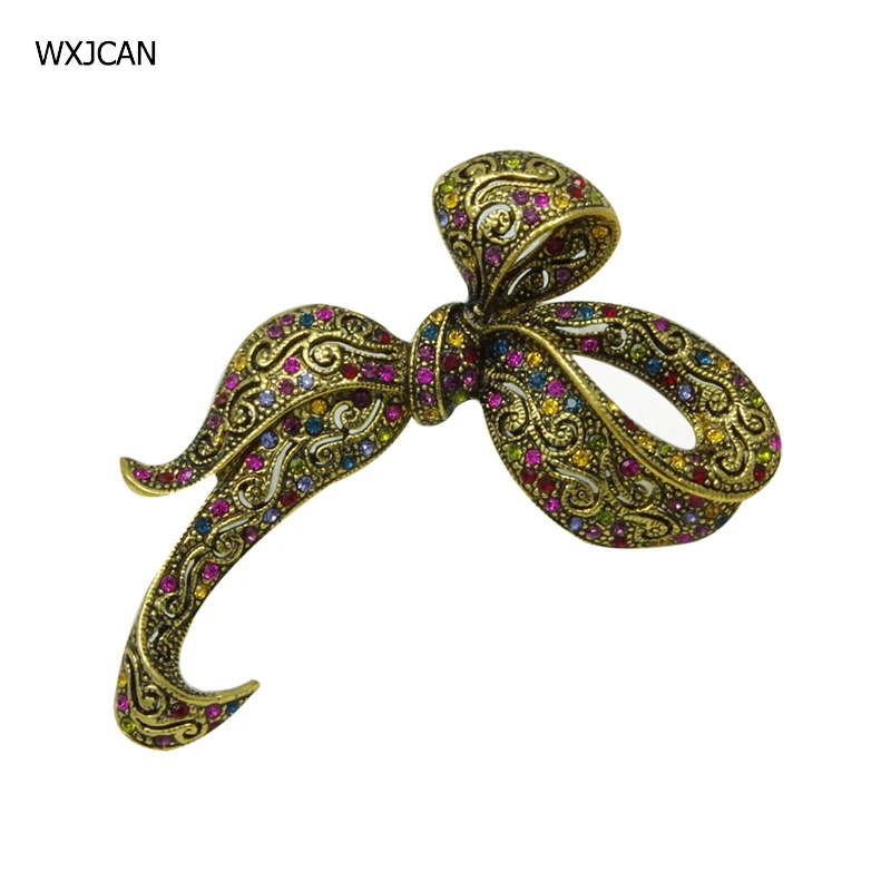 

WXJCAN bowknot brooch vintage brooches Metal sculpted hollow pattern inlay rhinestone brooch Large brooches Size 70mm*45mm