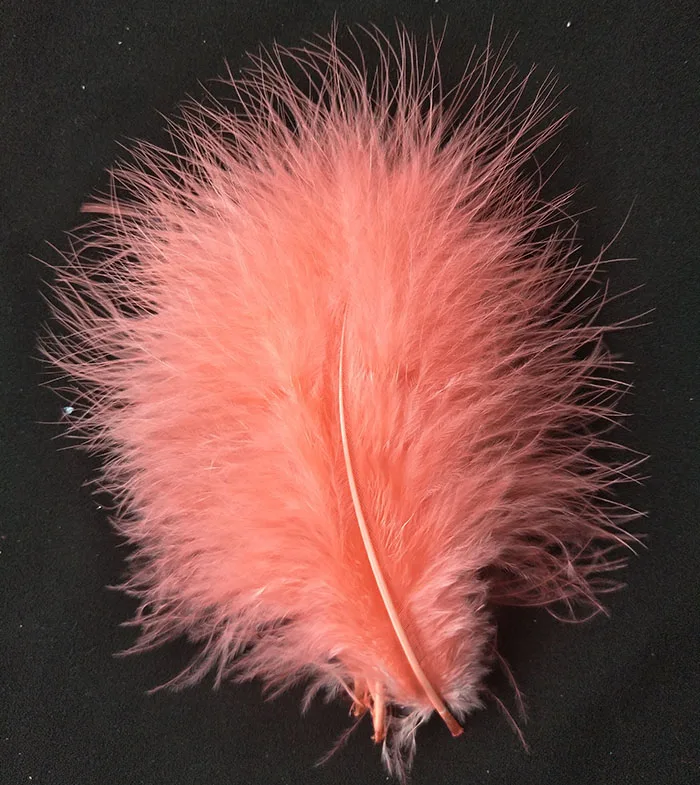 куриные перья. куриное перо. пуховые перья. гусиный пух. петушиные перья в волосы.