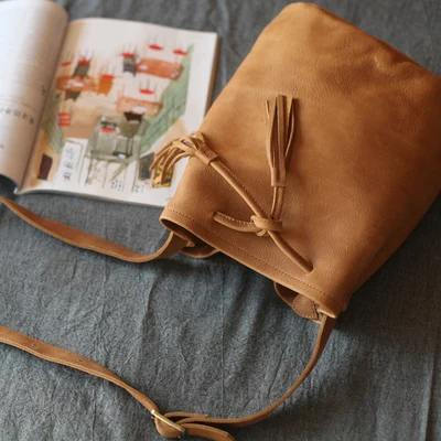 Vendange nieuwe mode Eoupean en Amerikaanse Stijl lederen Handgemaakte kleine Emmer bag8857S Vendange nieuwe mode Eoupean en Amerikaanse Stijl lederen Handgemaakte kleine Emmer bag8857S