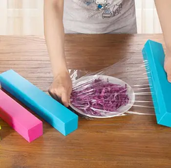 

Home Foil Cling Film Cutter Wrap Dispenser Cutter Plastic and Stainless Steel Storage Roll Holder Kitchen Tool Colour Random