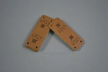 

Low MOQ custom four holes decorative genuine leather label for sewing on hats