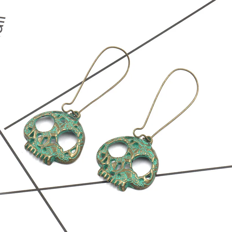 

TopHanqi New Vintage Skull Alloy Earrings Female Fashion Popular Big Ear Hook Exaggerated Punk Earrings Women Jewelry Wholesale