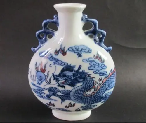 

Elaborate Antique Chinese blue and white porcelain dragon oblate vase