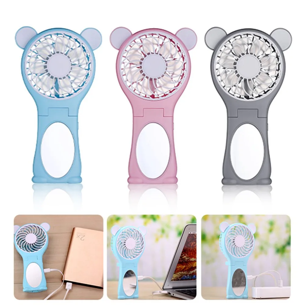 

Miniature portable handheld mirror ultra quiet fan rechargeable lithium battery portable handheld Mini USB cute cartoon fan