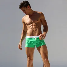 2016 New Low Waist Men’s Swimming Trunks Pocket Beach Surf Board Solid Shorts Mens Swim Suits Sexy Men Swimwear Swimsuits
