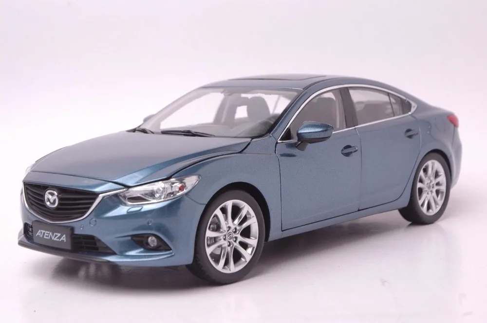 Модель фав 1/18. Игрушечную мазду. Игрушечную мазду. Mazda 1:32. Модель mazda 3 хэтчбек игрушка.
