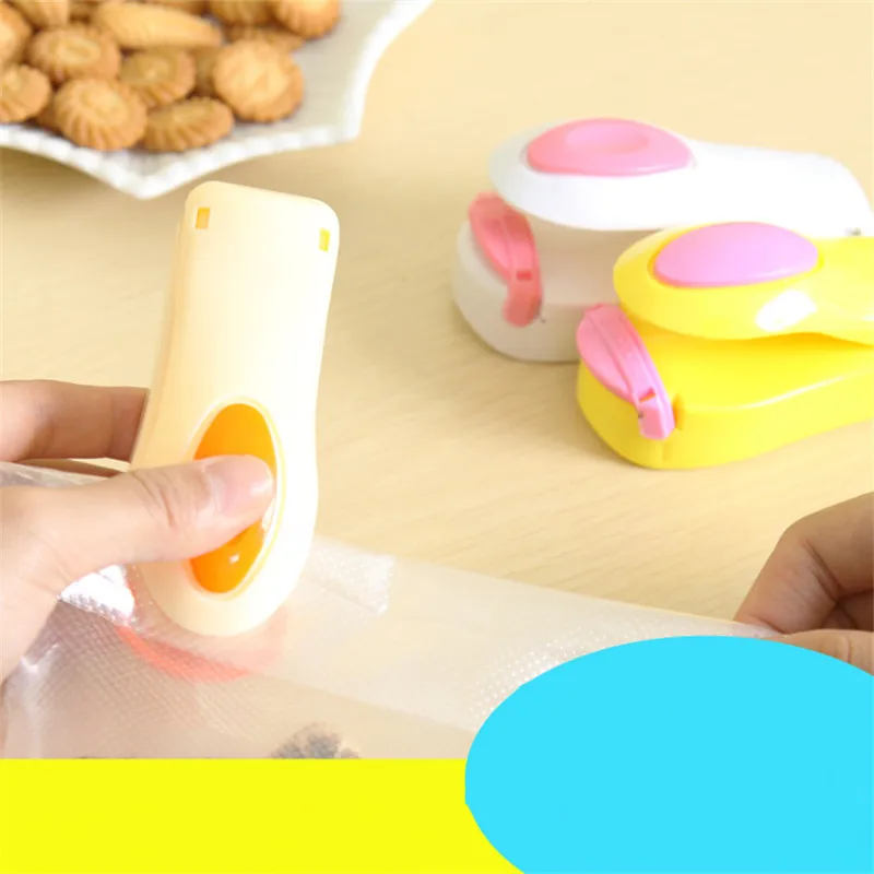

New home portable mini snack bag sealer sealing machine sealing machine hand pressure Travel Free shipping