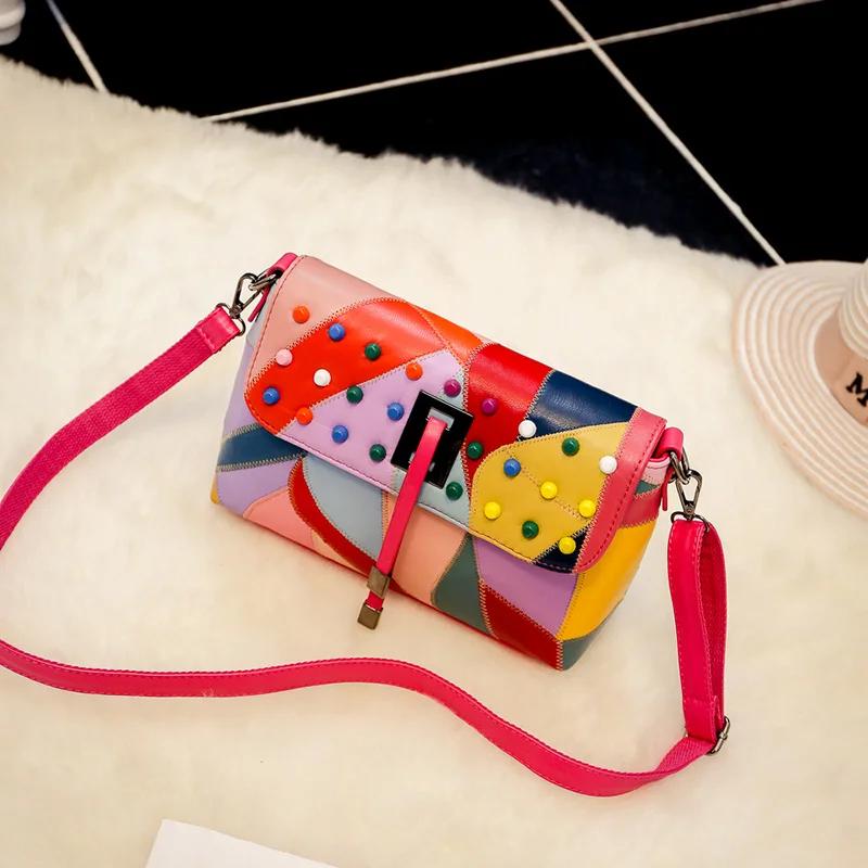 

The new trend of 2017 hot new trend atmosphere color women's one-shoulder bag of 100% Genuine Leather handbag cellphone pouch
