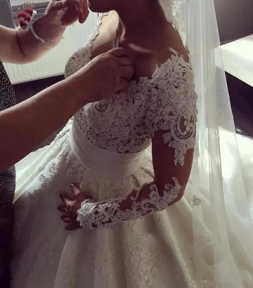 illusion-appliques-long-sleeves-a-line-castle-wedding-dresses-2019-sexy-v-neck-button-back-lace-skirt-bridal-gowns-2018-robe-de-marriage (4)_