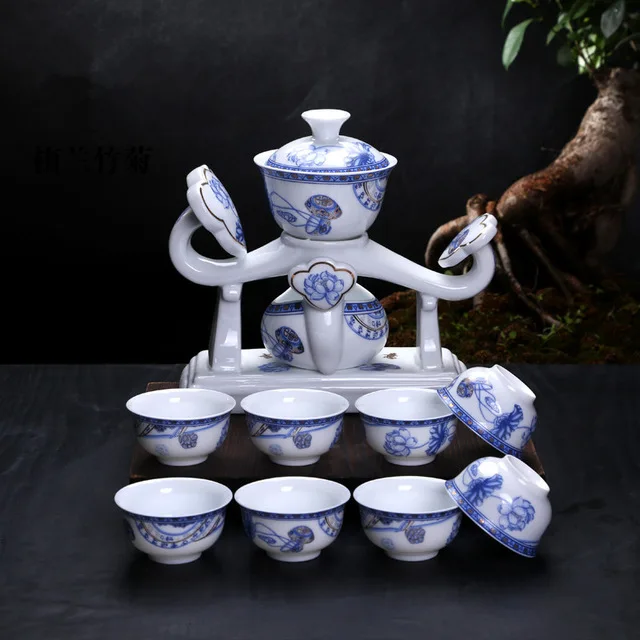 

New RuYi Porcelain Dehua Kung Fu Tea Set Cups Automatic White Ceramic Hollow Transparent Blue and White Tea Pot Cup