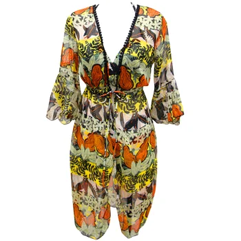 

Cute three-piece swimsuit pair with chiffon blouse beachwear