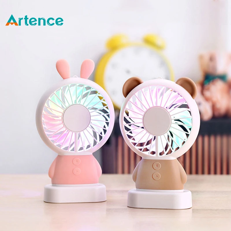 

Hot Sale Rechargeable Mini Portable Hand Fan For Travelling Outdoor Office Creative Cooling Fan With Colorful Led Night Light