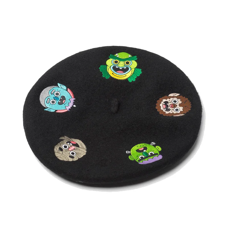 

Europe and the United States in autumn and winter new cartoon face embroidered wool beret painter hat ladies warm winter bud hat