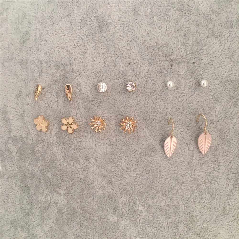 

CASUAL GOLD COLOR FLOWER WING CAMEO LEAF CLEAR STONE PEARL 6 PAIR STUD EARRING SET