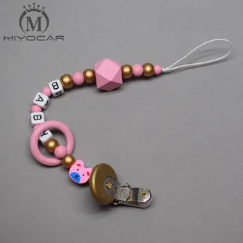 

CUSTOM Any name Hand made pink Hexagonal and gold wooden bead dummy clip holder pacifier clips