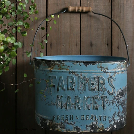 

traditinal handmade hand antiqued pierced metal bucket planter with handle