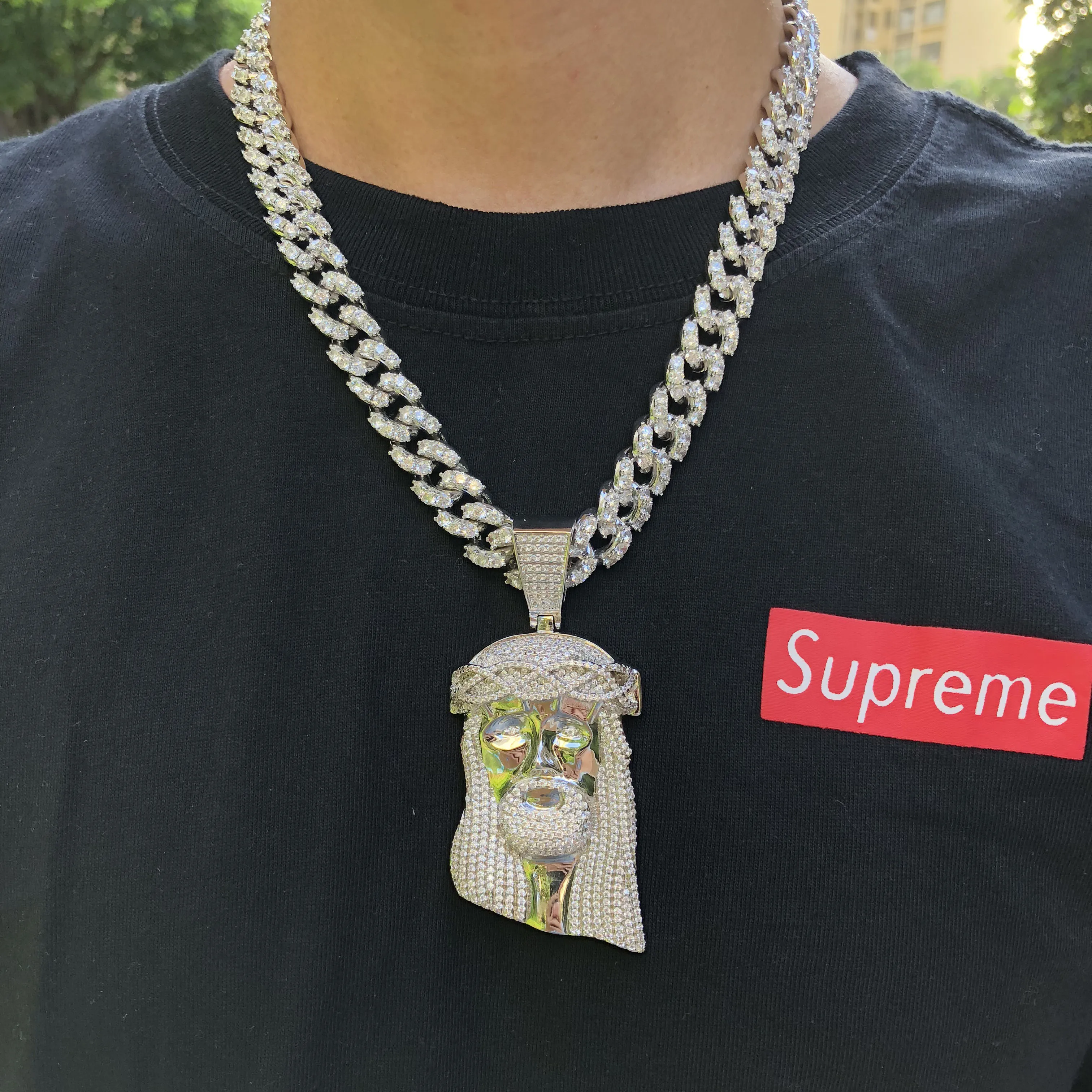 

Iced out big Jesus pendant with cuban link chain