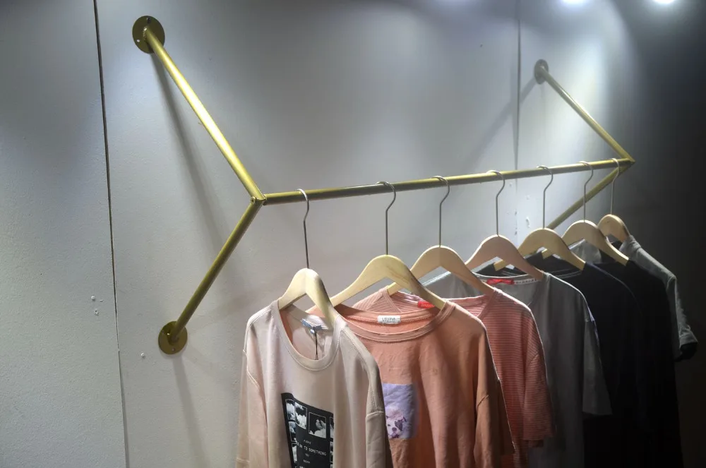 Clothing store hanger display rack Hanging hangers on walls goldenin Storage Holders & Racks