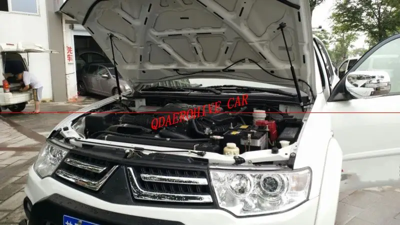 

QDAEROHIVE car hood reuses the gas spring support rod Slow Down Shock Gas Strut for Mitsubishi PAJERO V93.V97 V77 V33 PAJERO IO