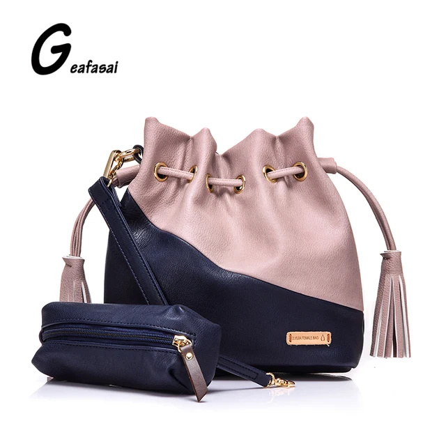 black contrast bucket cross body bag