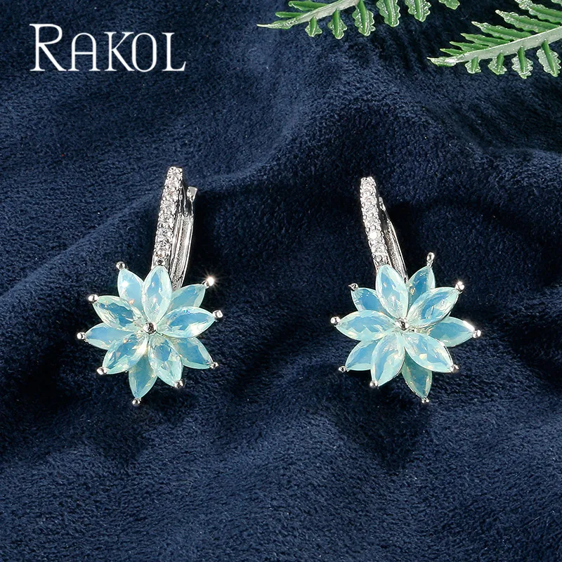 

RAKOL New 7 Colors Trendy Flower Shape Cubic Zircon Hoop Earrings For Women Girl Party Dinner Dress Jewelry RE82120