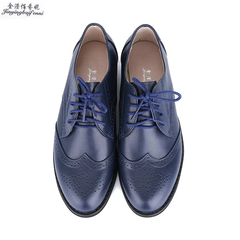 navy and tan shoes