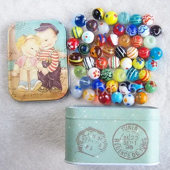 

Free shipping 52pcs/lot 16mm to 18mm fancy design excellent ball marbles ball glass vase decoration with tin box package