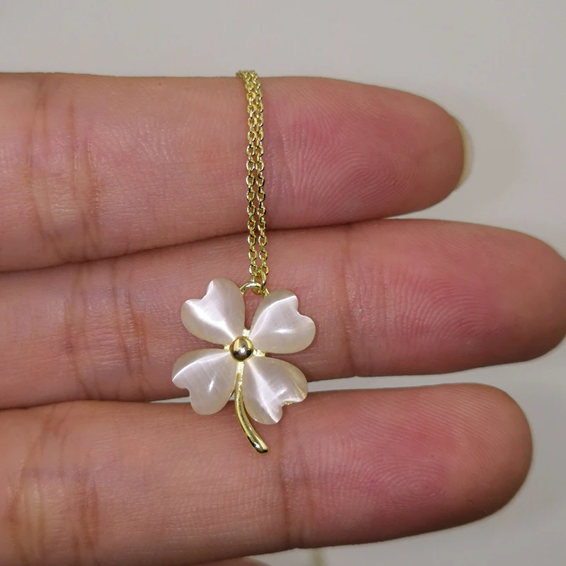 four leaf clover pendant necklace in sterling silver with 18k yellow gold plating setting cat's eyes stone opal 