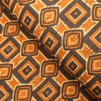 

From Portugal Natural cork fabric patterned with ethnic orange and brown designs Cork Textile COF-203