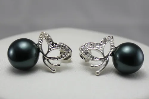 

Hot sell Noble- hot sell new - cute black shell pearl and silver plated butterfly Stud Earrings