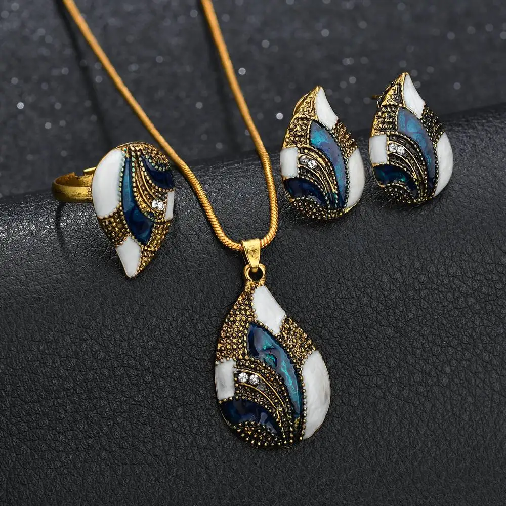 

Terreau Kathy 2018 New Personality Shell Shape Long Pendent Necklace Stup Earrings Deligant Ring For Women Wedding Jewelry Sets