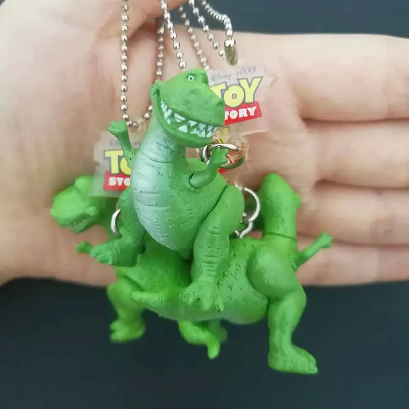 

50pcs Toy Story Cute Mini Rex Dinosaur PVC Action Figures Toy Small Rex Model Doll Keychain Pendant